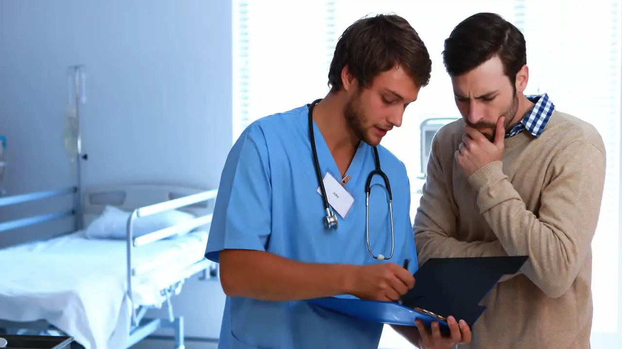 Doctor showing medical report to man