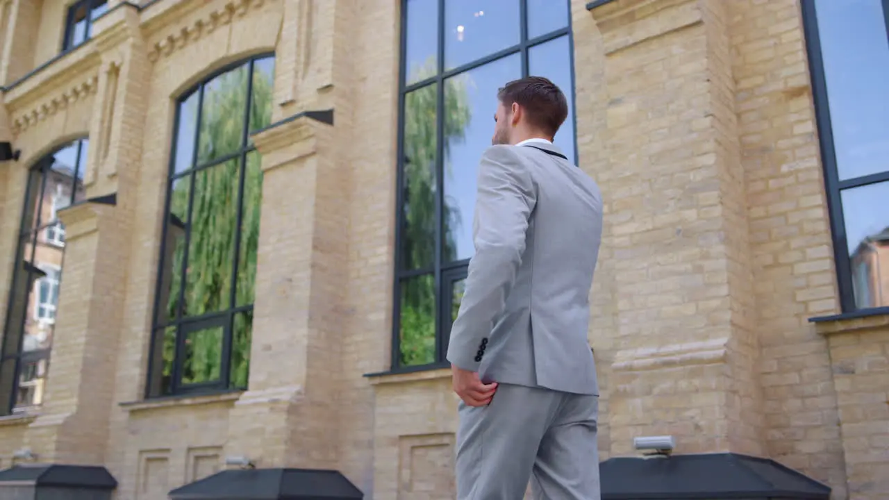 Suit man calling mobile phone on street Business people using devices outside