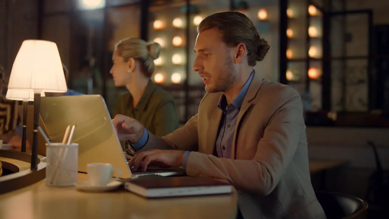 Boss using laptop on meeting with team Creative colleagues discussing business