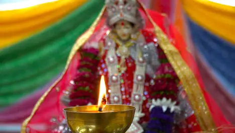 Lit Brass Lamp With Hindu Goddess Durga Mata Ji At Celebration Of Navratri 1