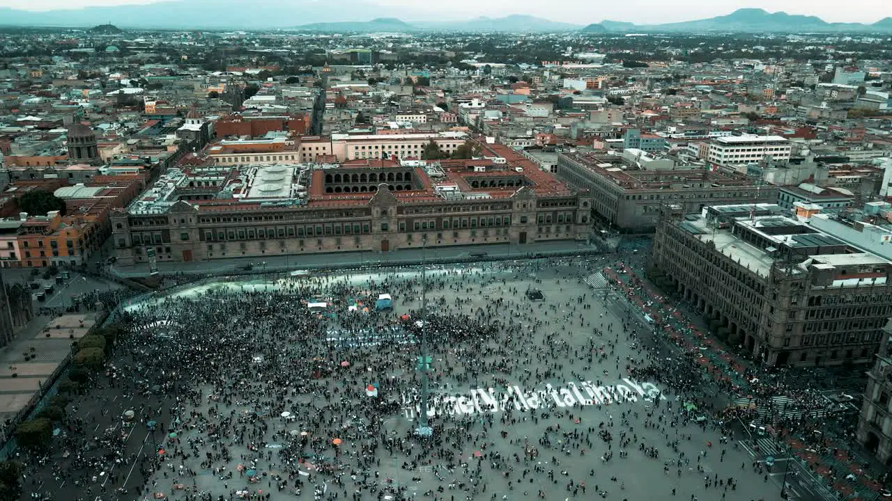 Rotational view from a drone of womans day rights march in Mexico city 2021