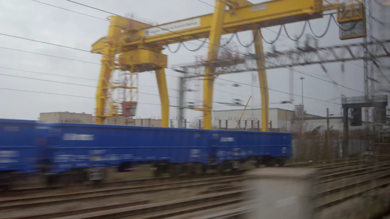 Looking out from train passing gantry crane