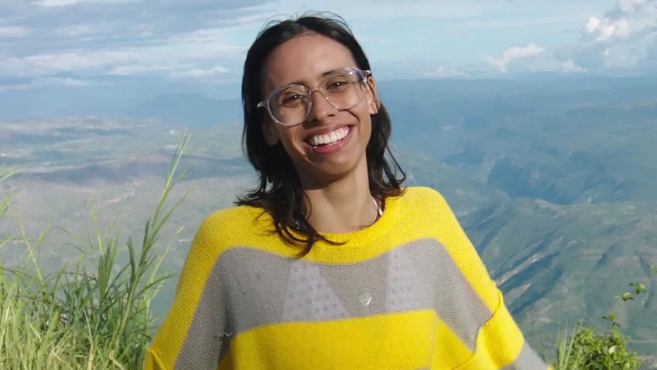 happy Latin Smiling woman on landscape