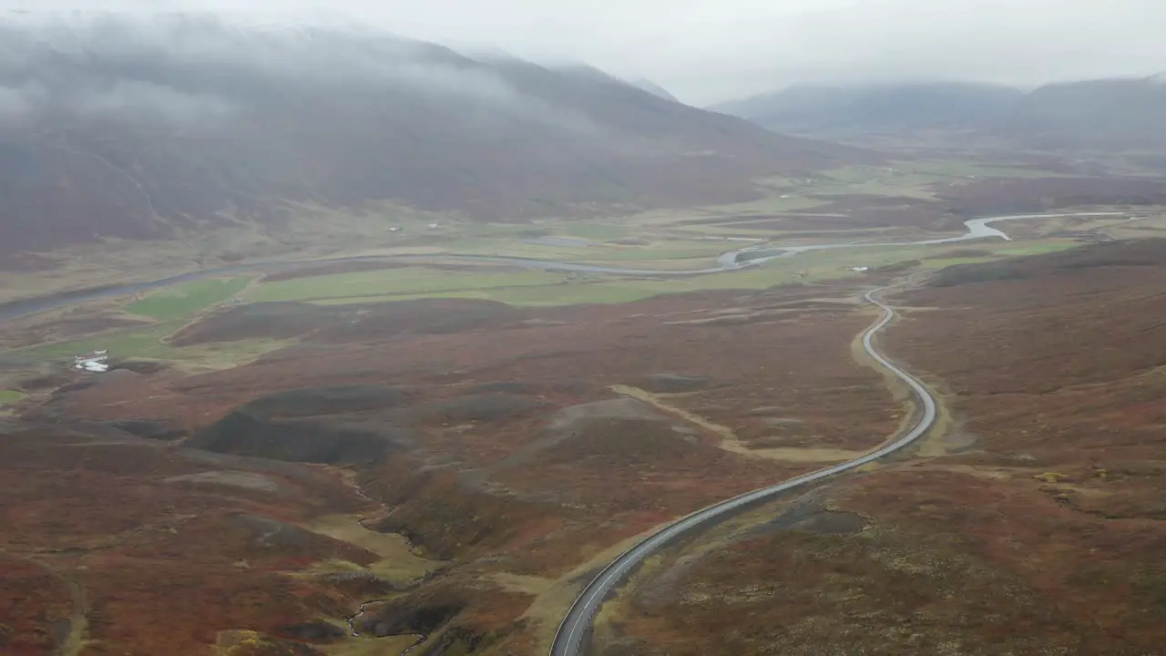 Scenic Highway With Autumn Nature On A Misty Morning Over North Iceland