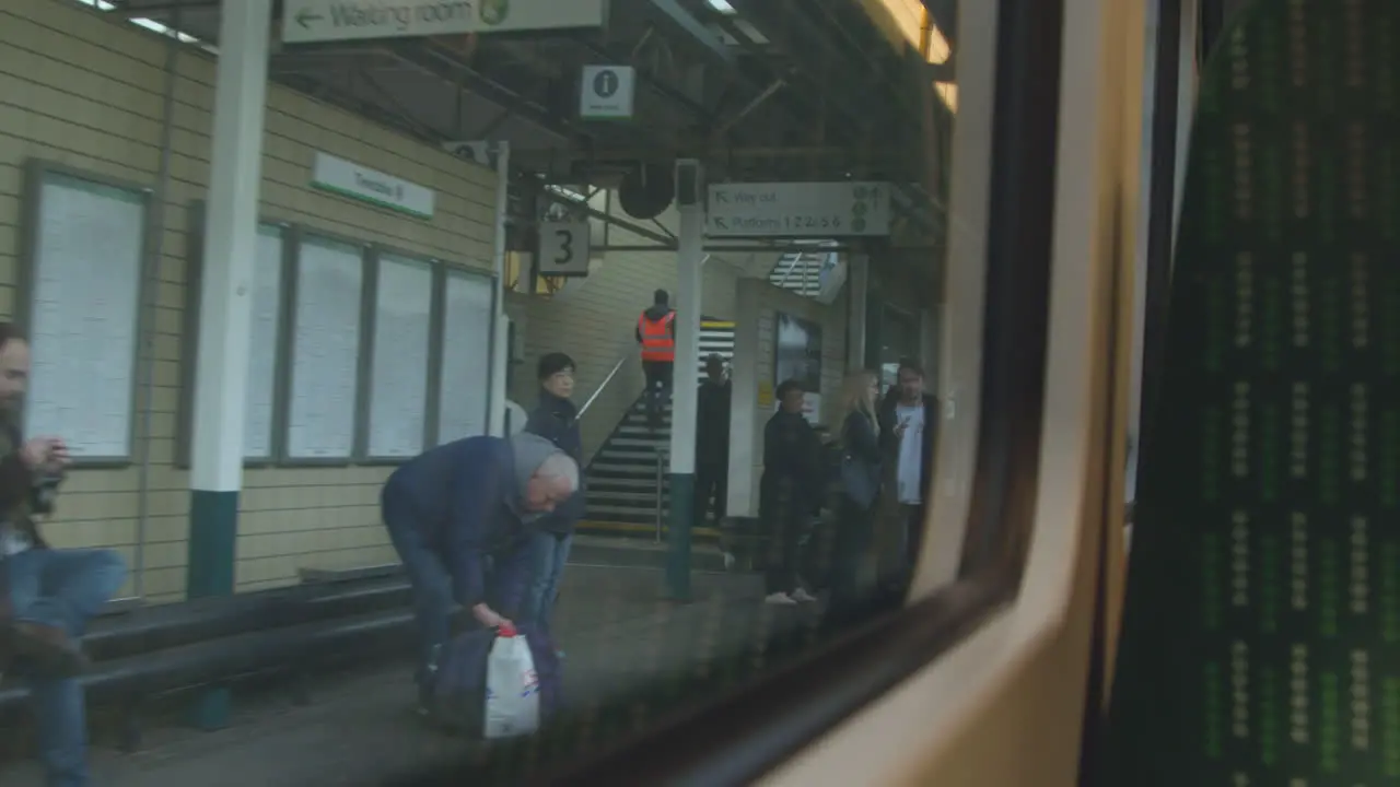 Train stopping at station awaiting passengers