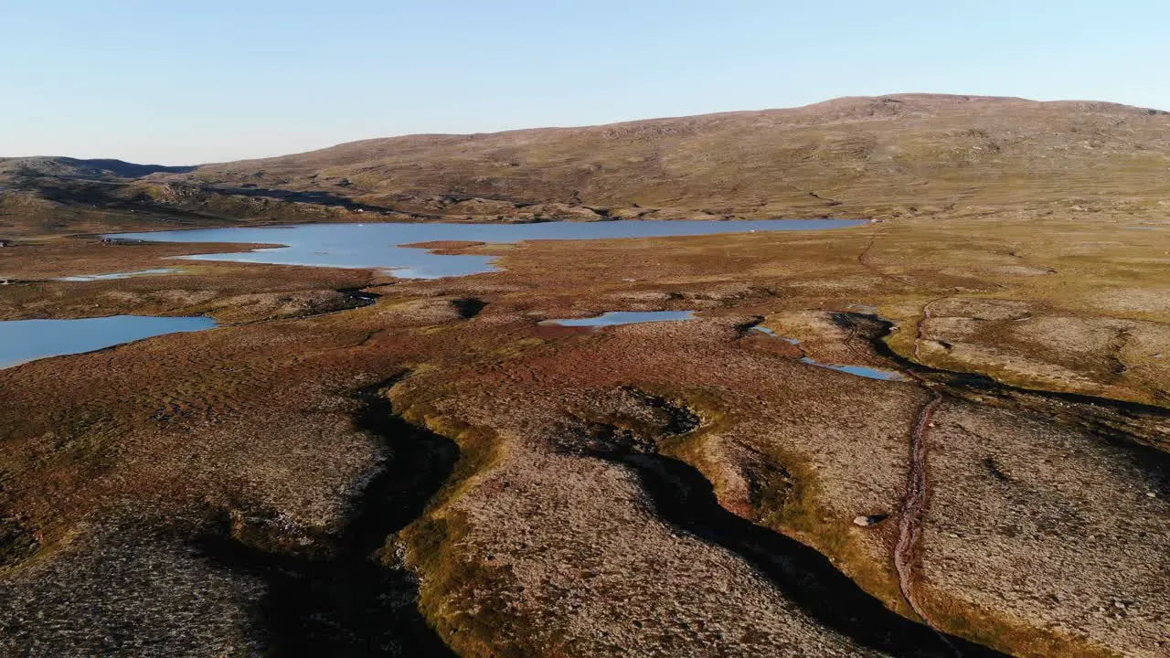 Zooming out drone footage of geological formations left from last ice age in Southern Norway