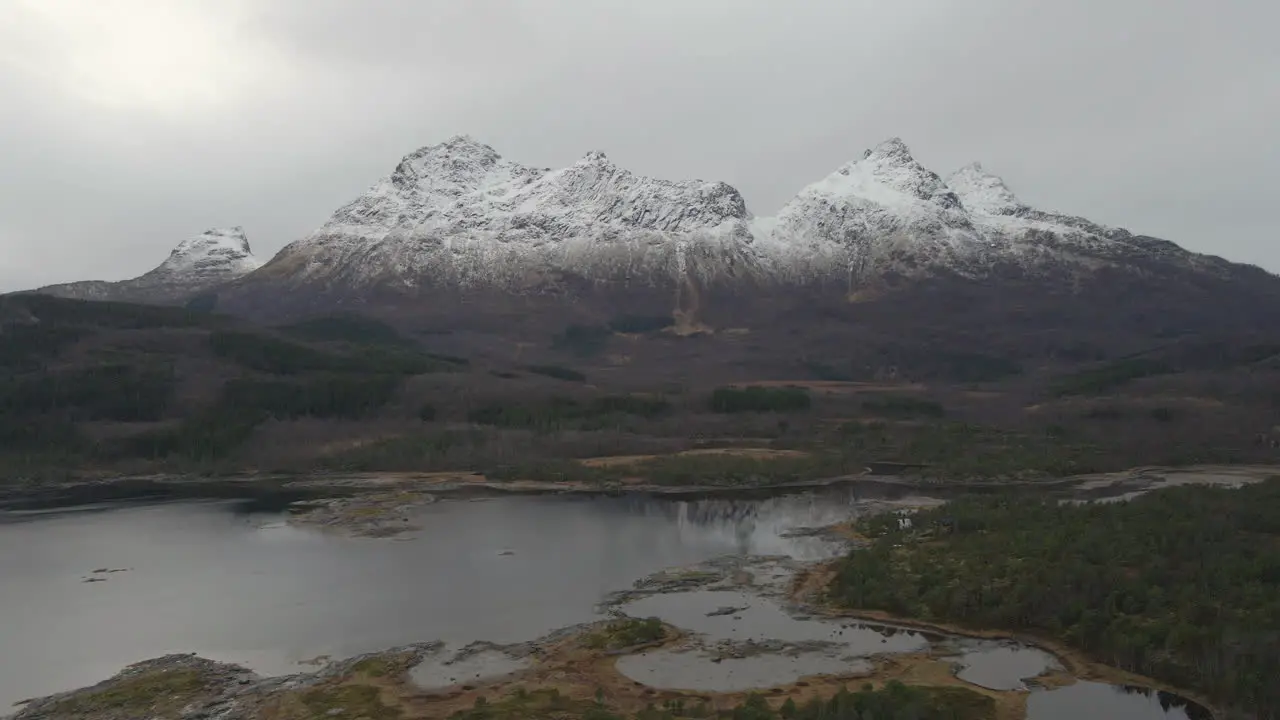 Beautiful Norwegian landscape with snow capped mountains and fjords