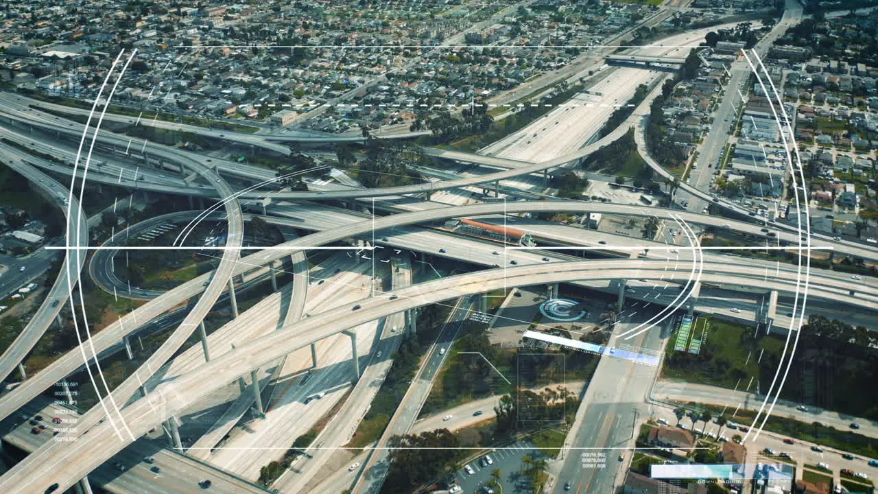 Aerial shot of large multilevel highway interchange in suburb Augmented reality showing additional info for targeted objects