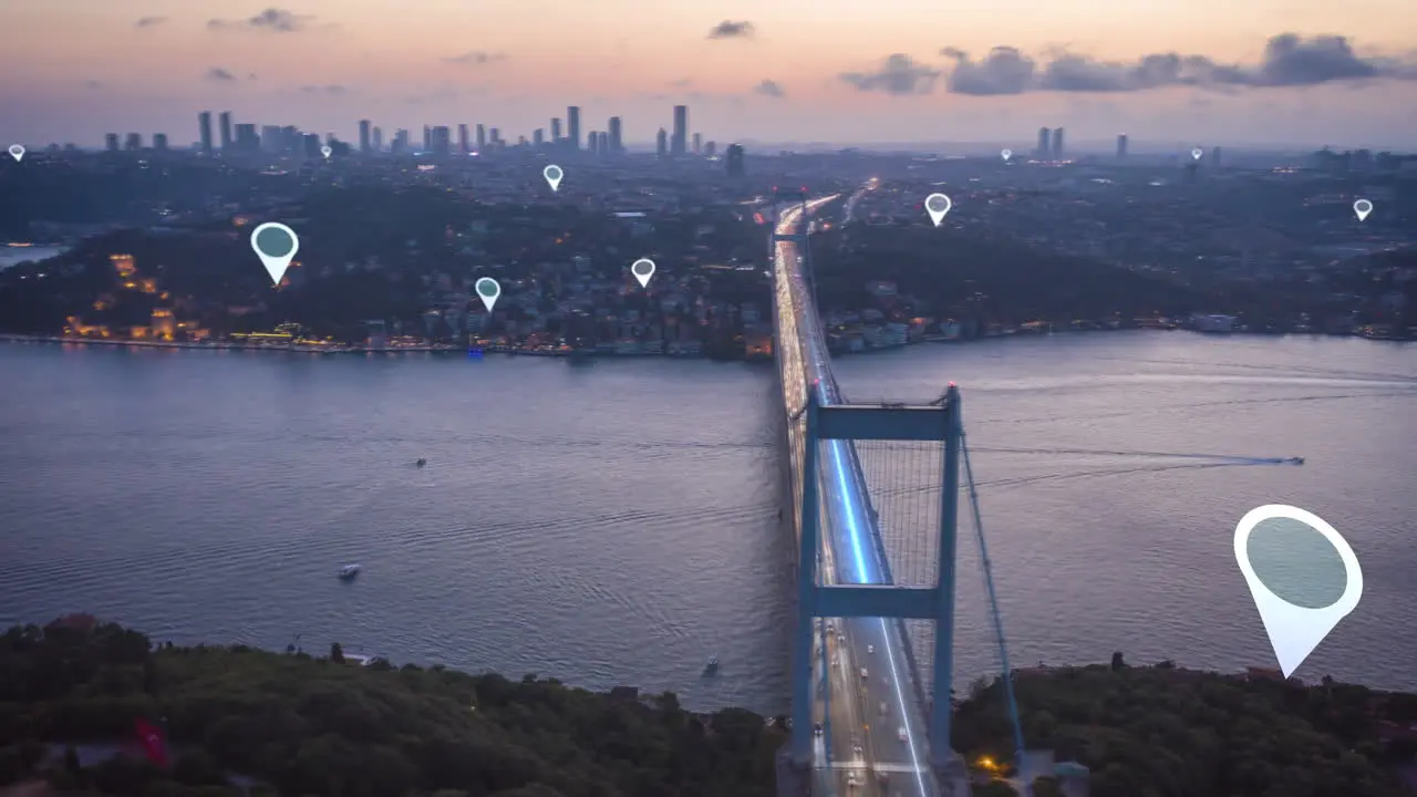 Aerial panoramic hyper lapse shot of Large cable-stayed bridge over Bosporus at sunset Visual effects highlighting heavy traffic and marking points of interest Istanbul Turkey