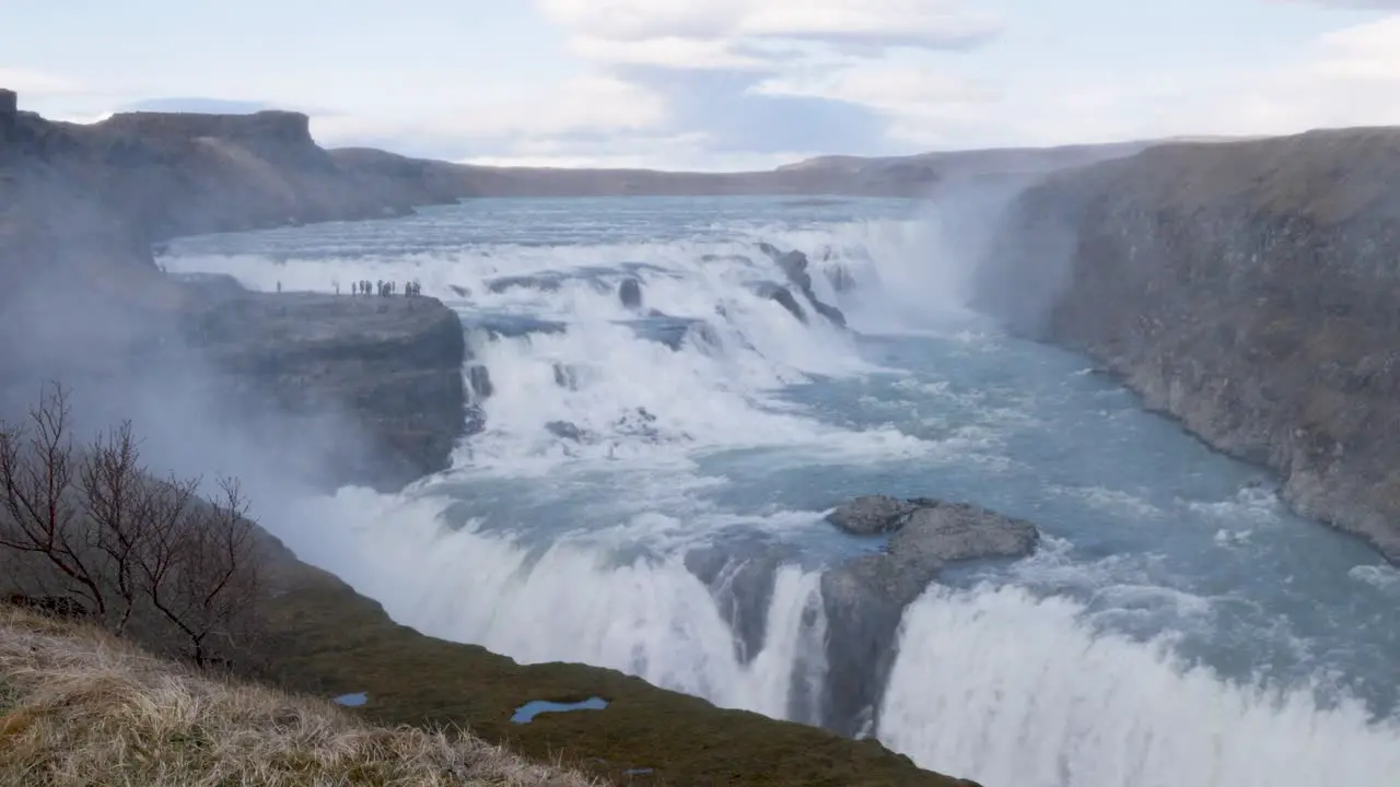 Water falling down over the Powerful Gulfoss waterfall in Iceland