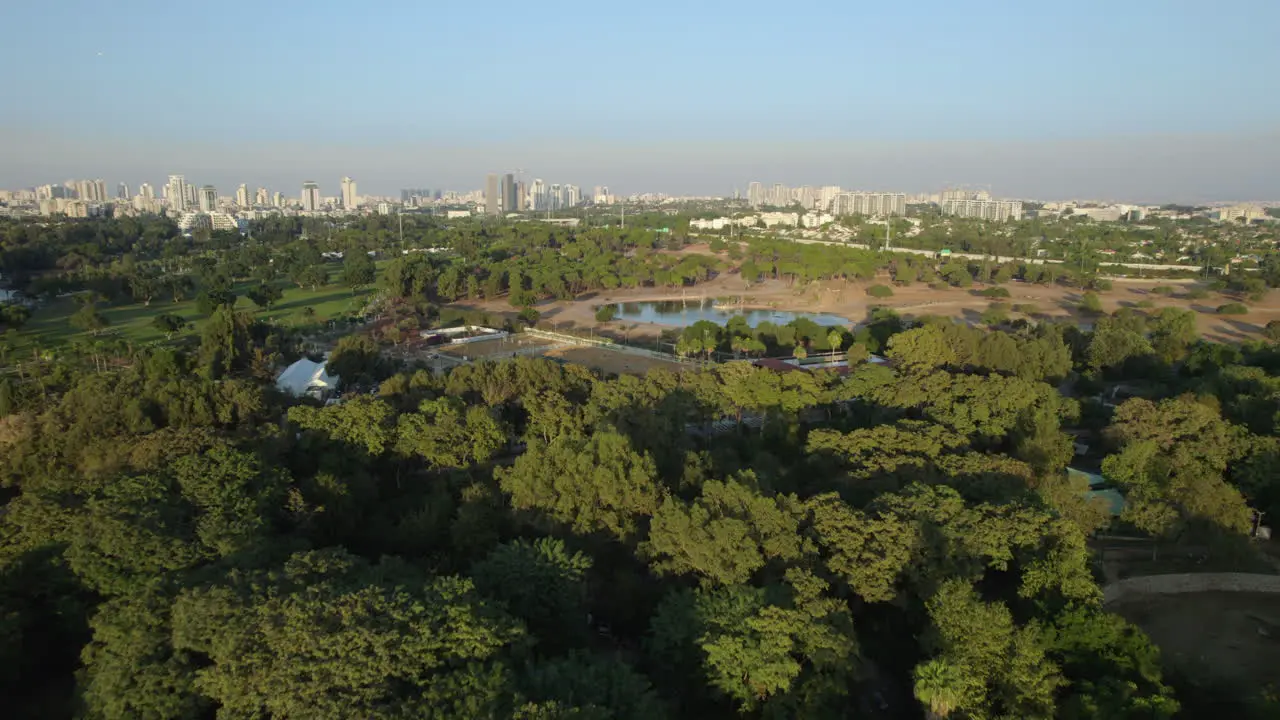 Aerial view over the Ramat Gan Safari area where all the animal cages are under the zoo trees on a calm afternoon when there are almost no visitors