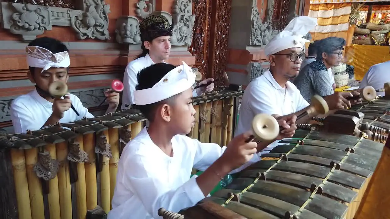 Kids Perform Gamelan Gender Music at Balinese Hindu Temple Ceremony Live Orchestra Tradition of Indonesia