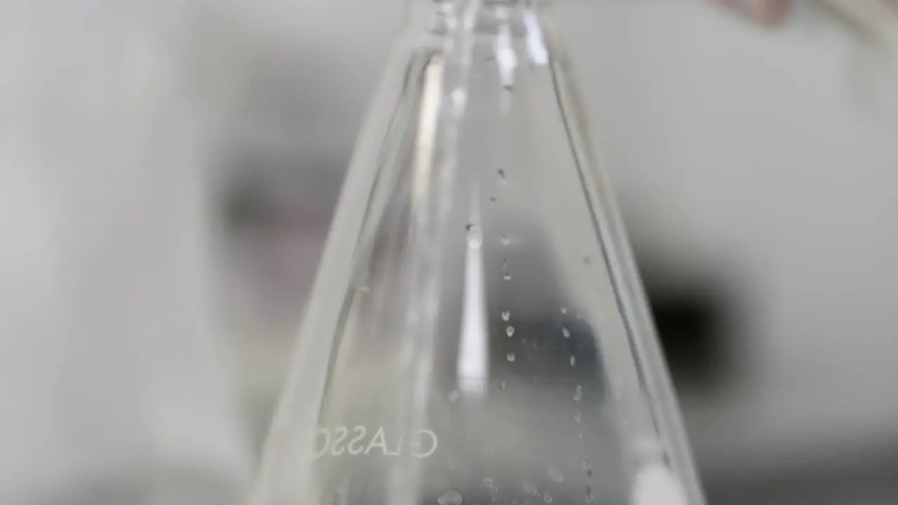 Scientist Experimenting Water Treatment Purity Test In A Science Lab