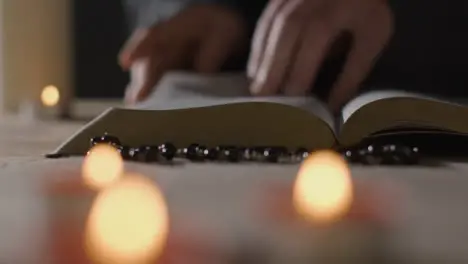 Tracking Shot of Man Reading Bible