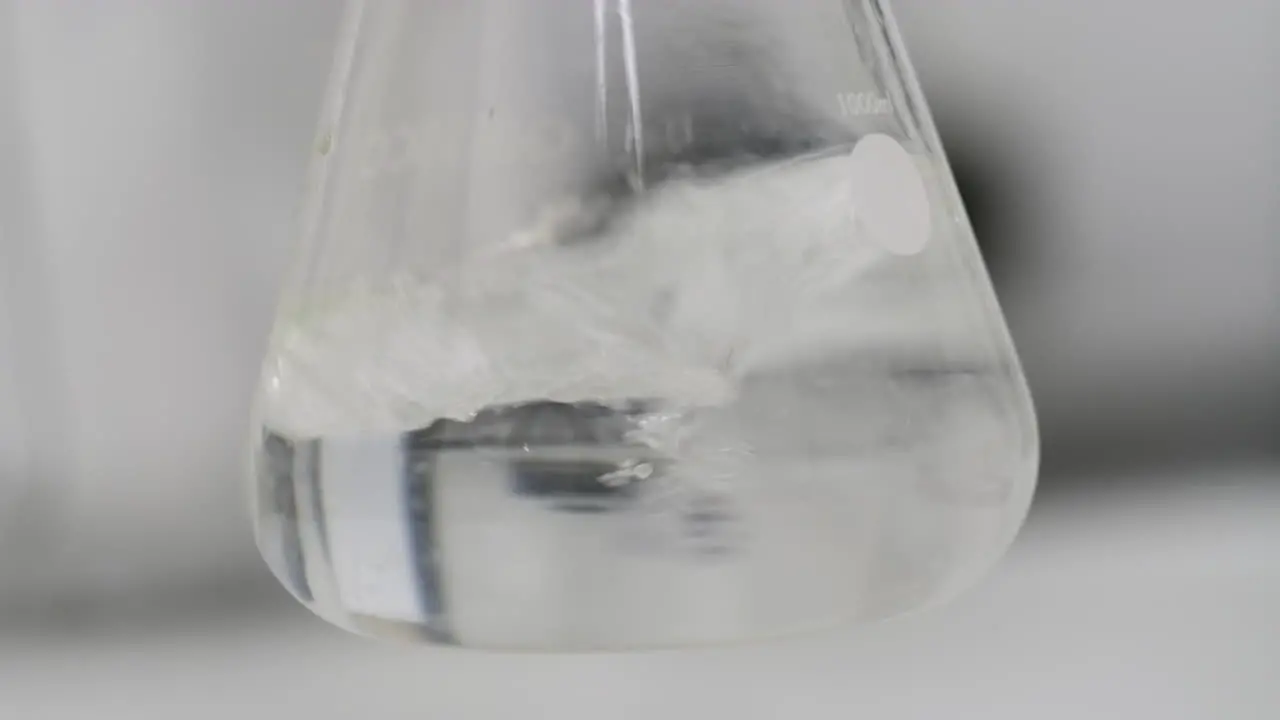 Closeup Of A Liquid Flask In A Lab During A Science Experiment