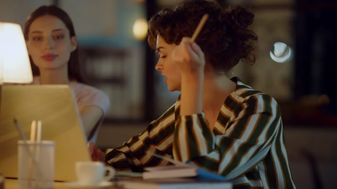 Business woman talking with colleague in office