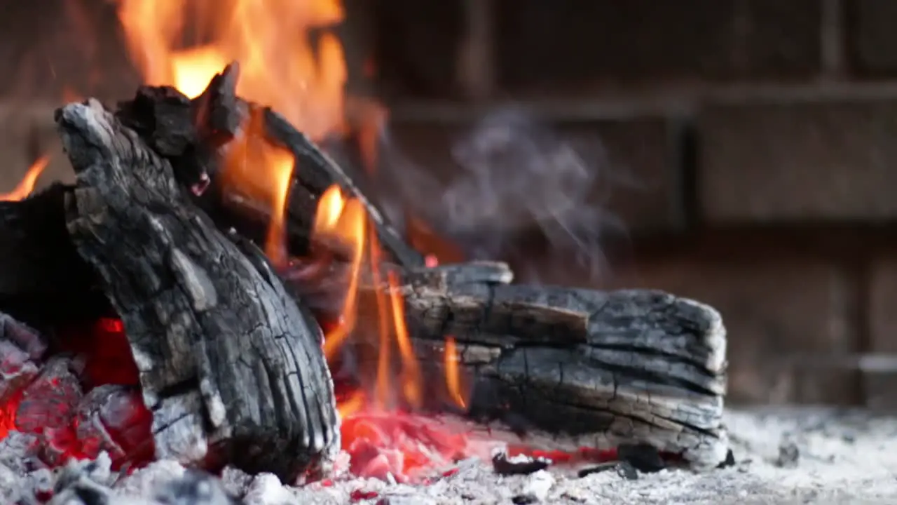 Wood fire burning panning left to right