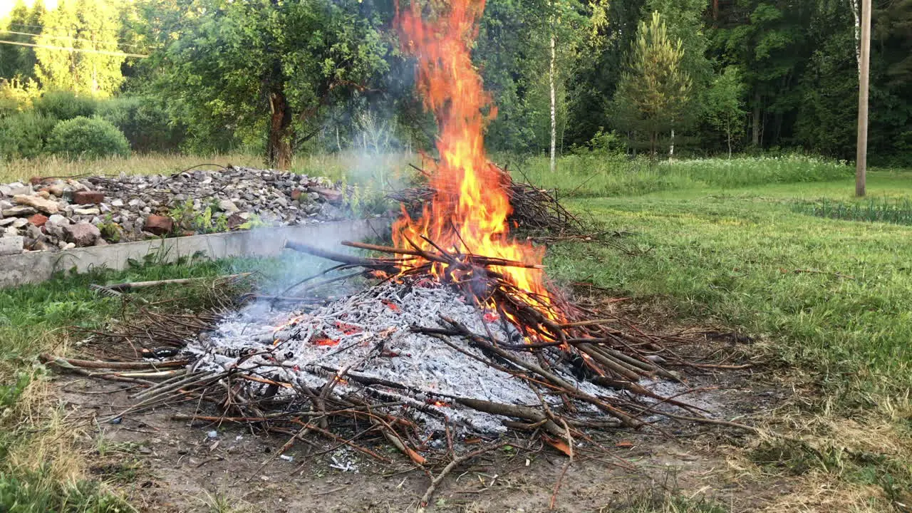 Big bonfire burning in a field