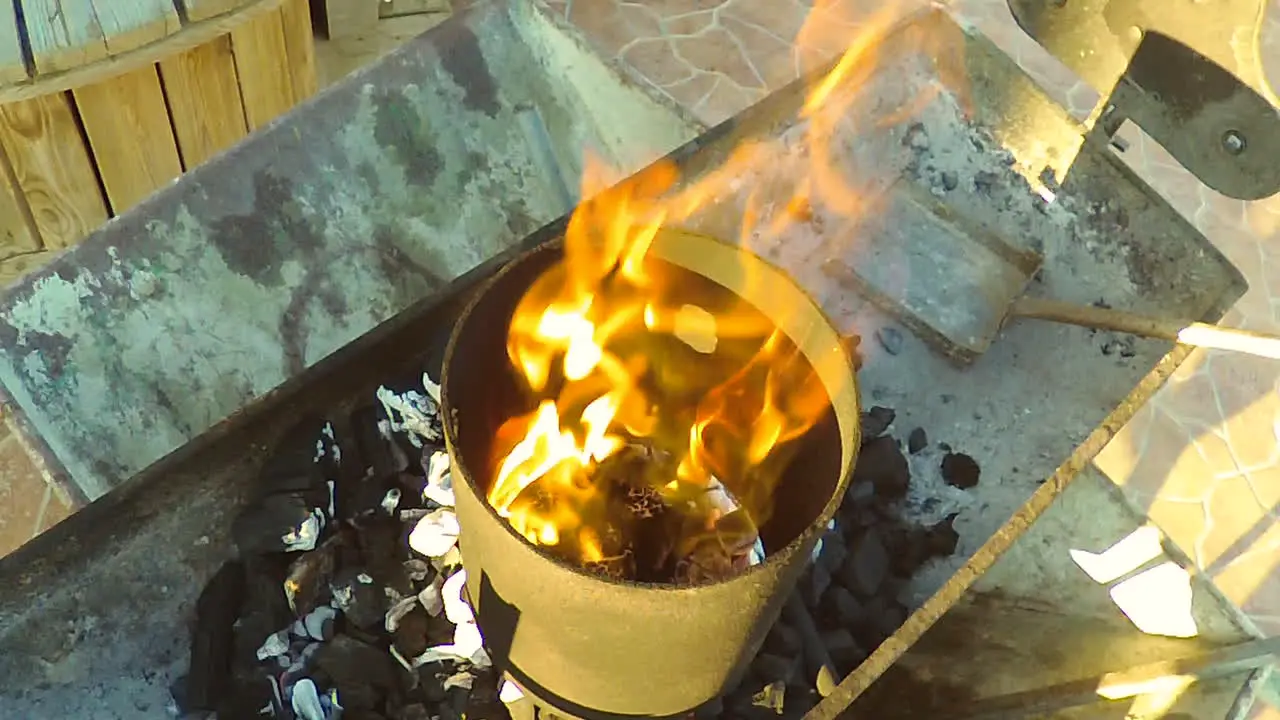 Inside the BBQ Funnel Watching the Flames