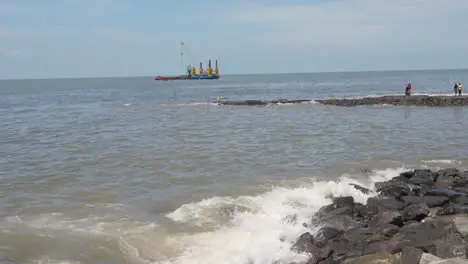 Close Up Of Waves Breaking On Bandra Fort In Mumbai India