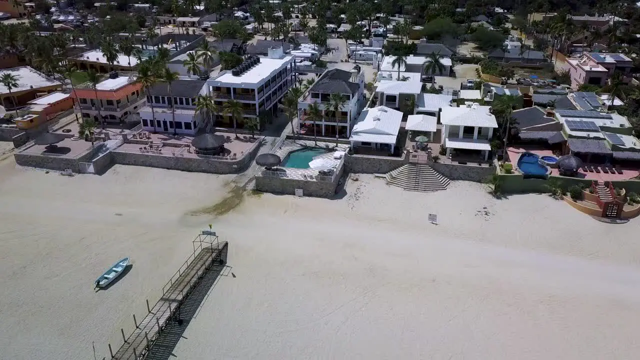 Beach Houses in Coastal Town of Baja California in Mexico Aerial Drone Flying View