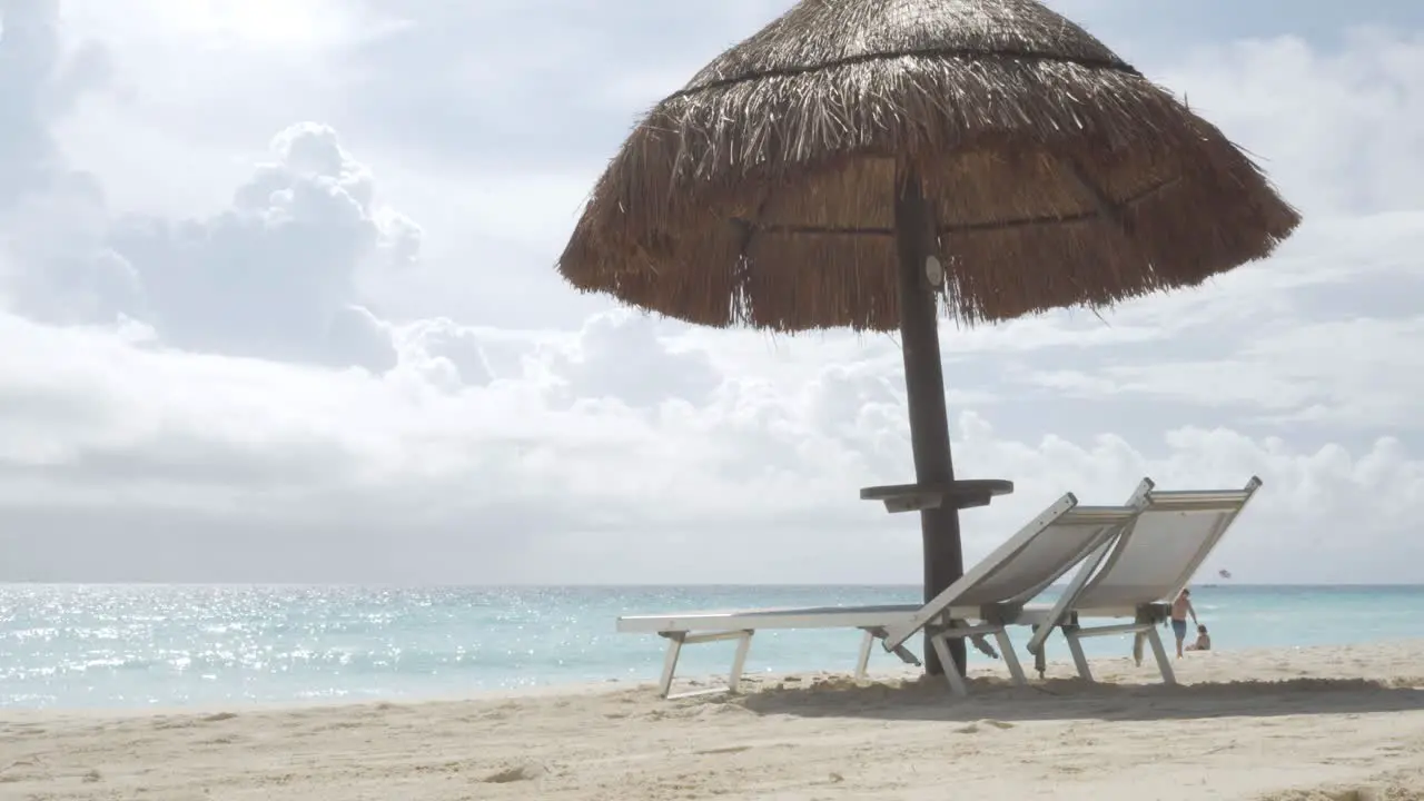 Beach beds and sun umbrella at seaside