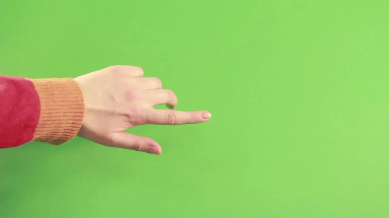 Man hand in studio isolated on green screen Hand pointing on background