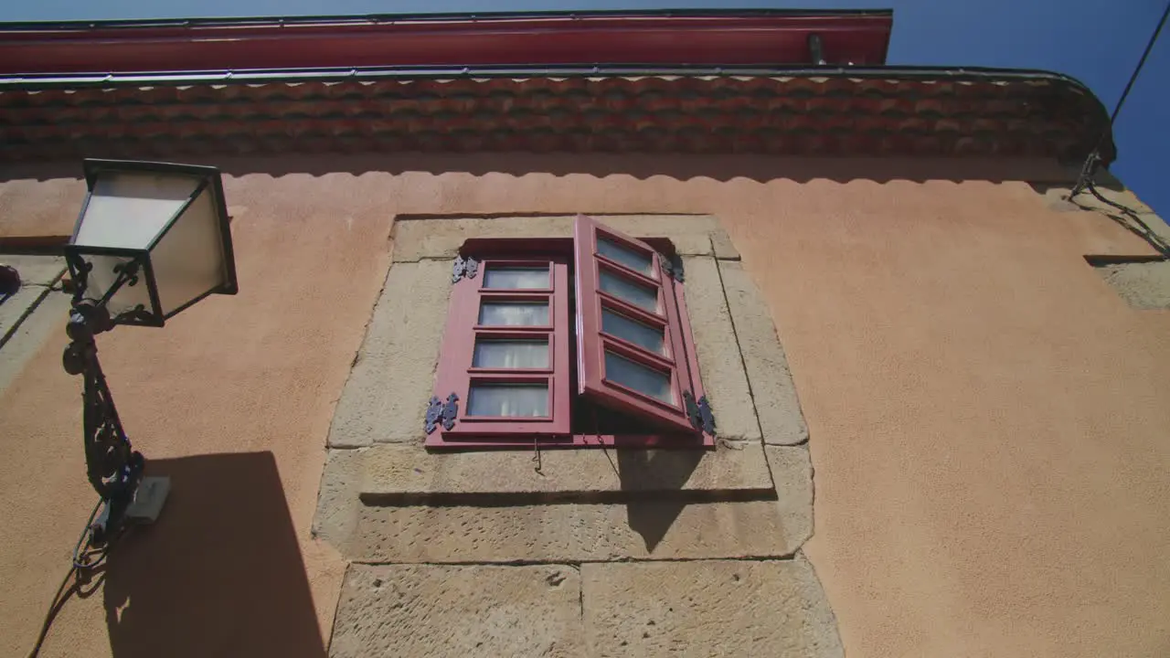 Exterior shot of a window of a house in Gijon Asturias Handheld Slow Motion