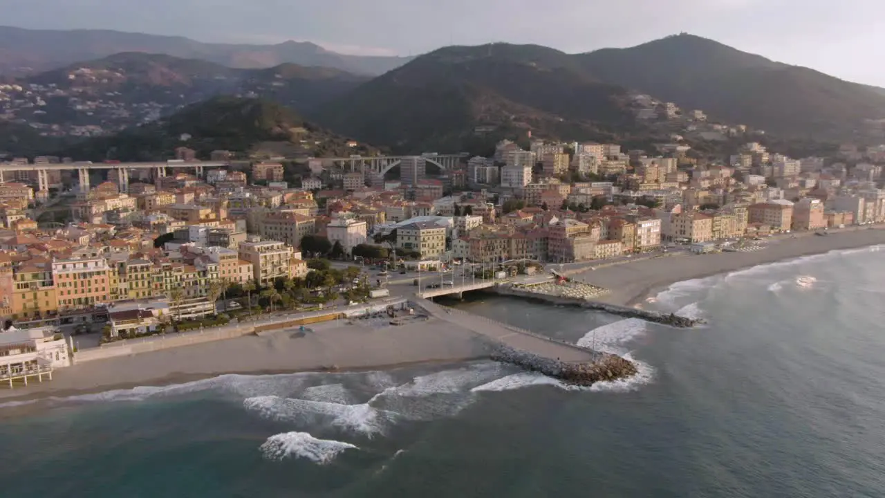 drone shot of a beautiful spring sunrise at the coast of west italy in varazze