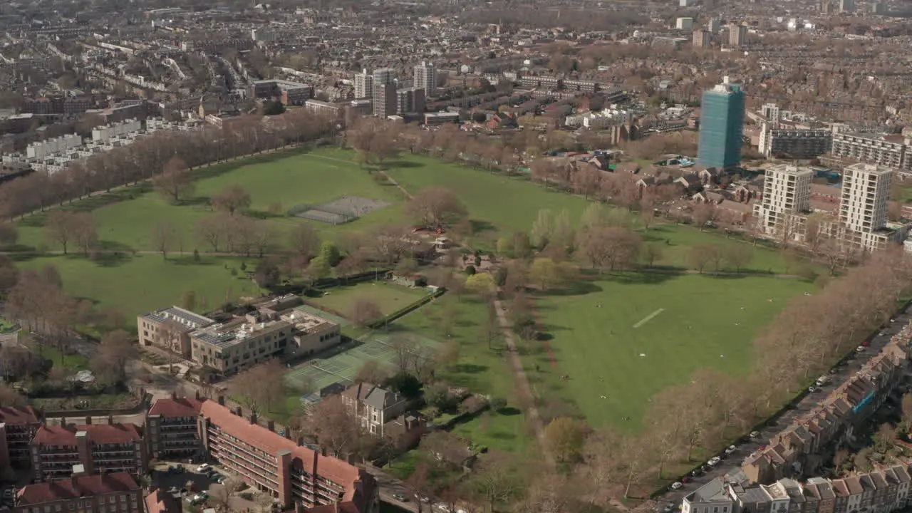 Tight circling aerial shot of Hackney downs park east London