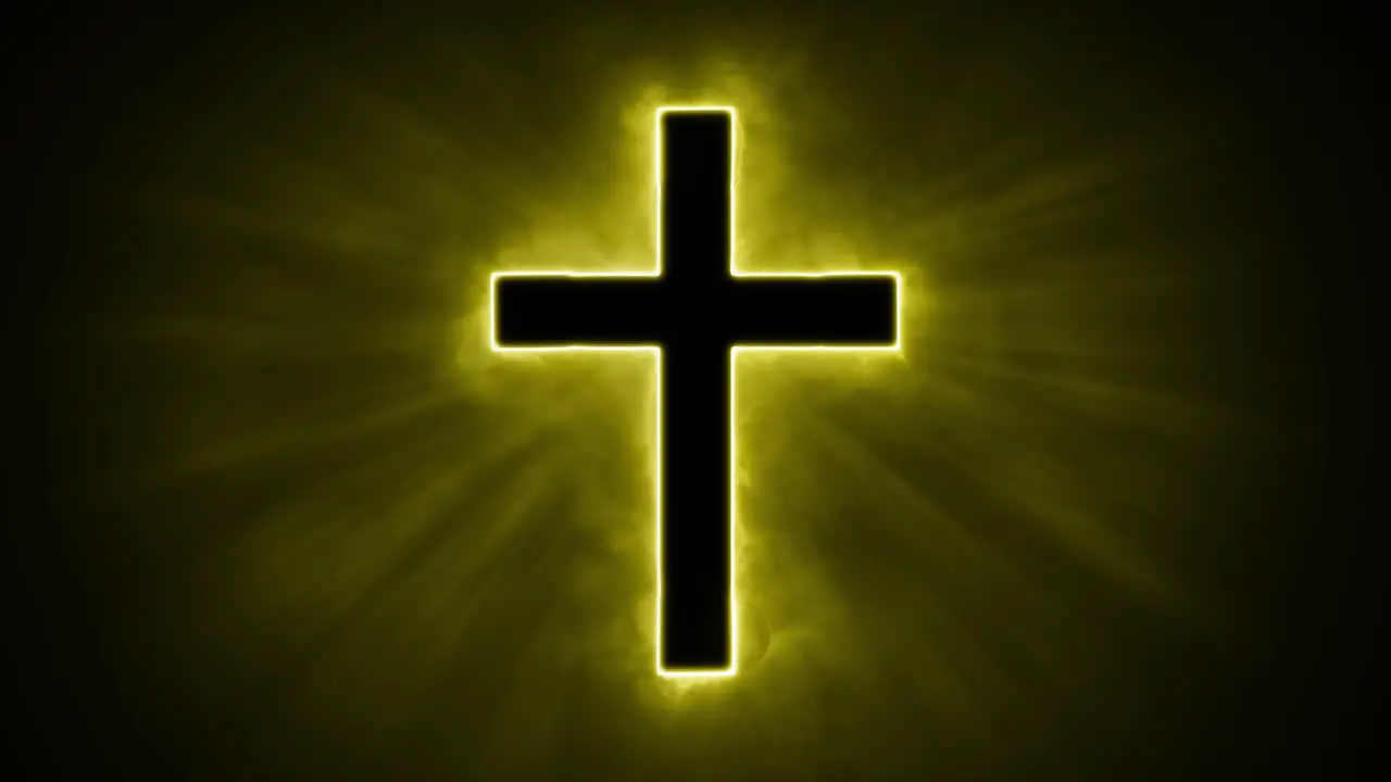 Uplifting and deeply inspiring reveal animation of a plain classic golden holy Christian crucifix cross in a smoky mystical glow and emating shining God rays and light beams on a black background