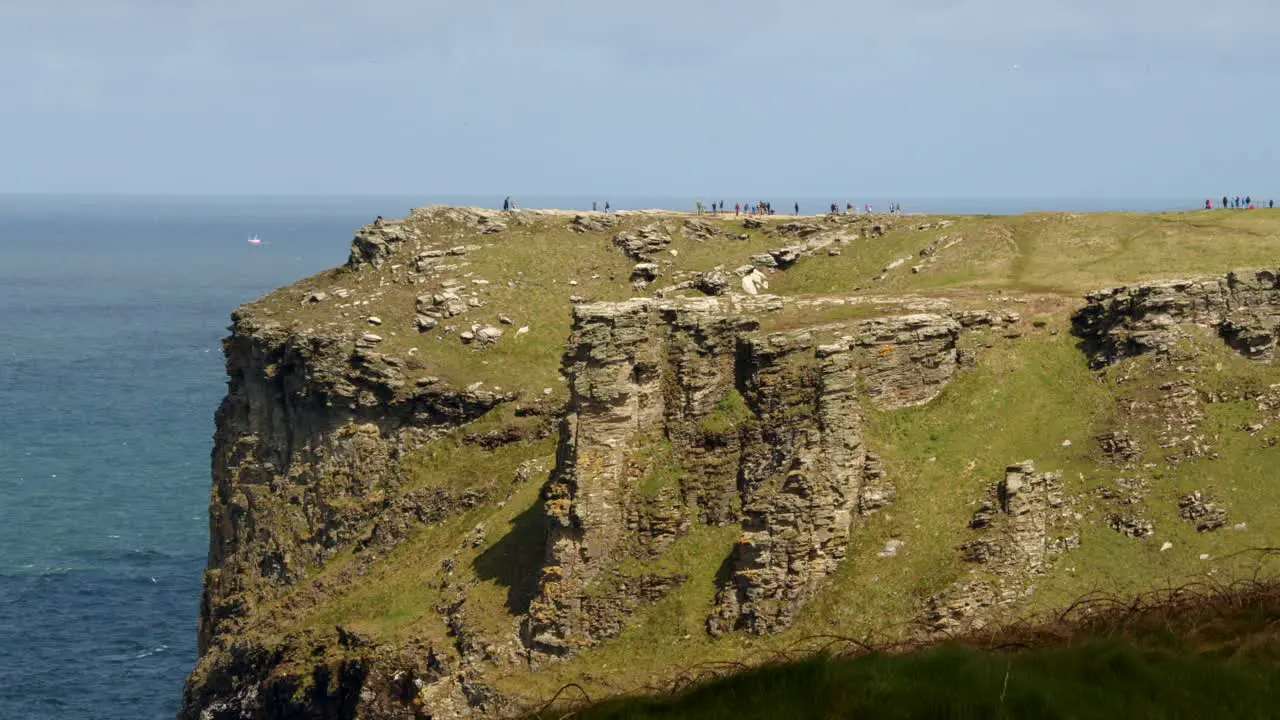 mid shot looking at Tintagel cliffs from Lower Penhallic Tregatta