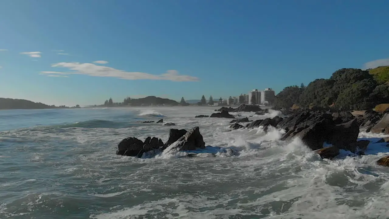 AERIAL SLOW MOTION Waves breaking over rocks clip 7