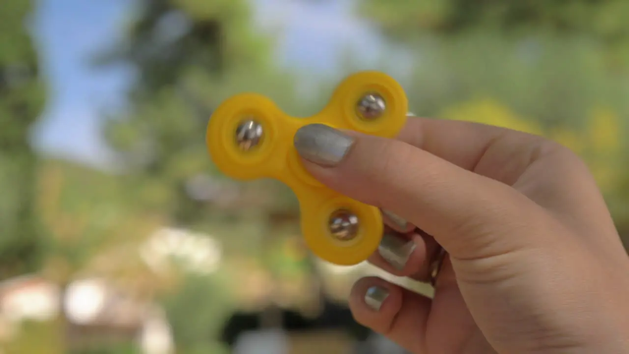 Woman relaxing with spinner fidget