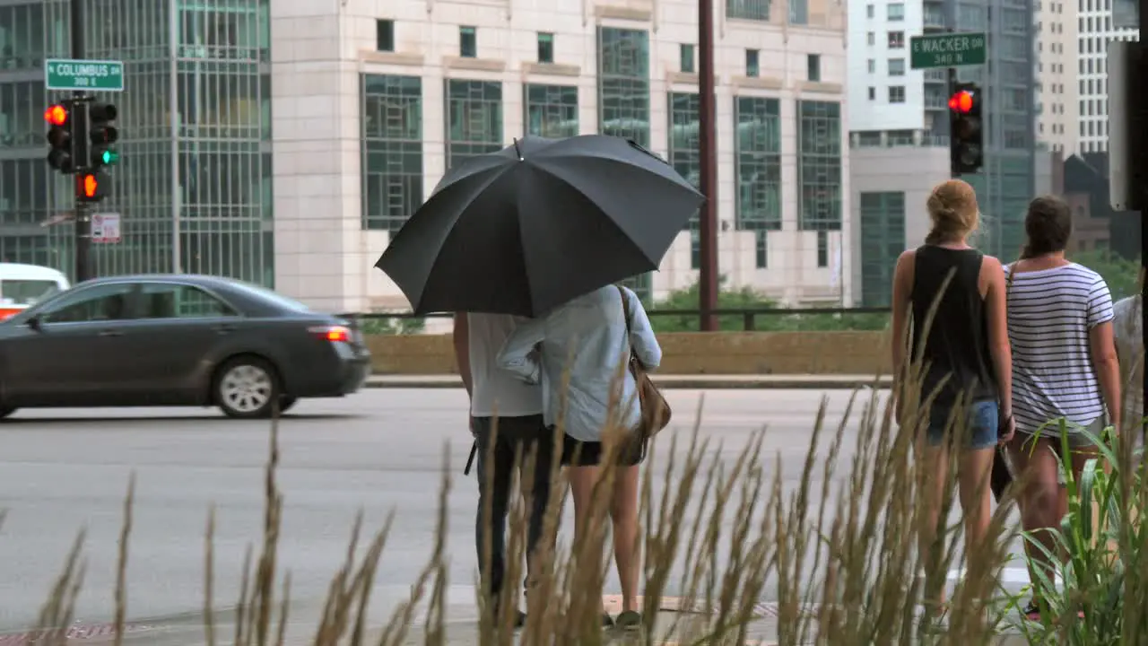 Couple Stood with Umbrella in Chicago