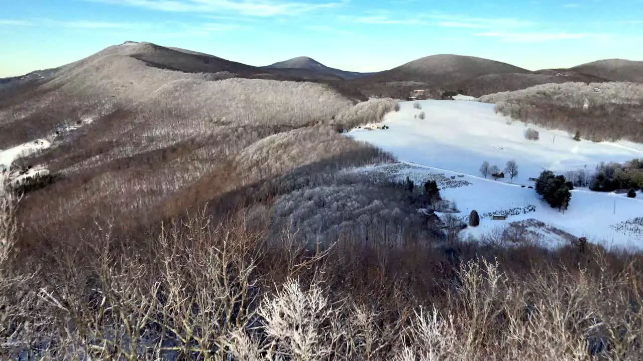 rime ice on treetops aerial in winter near boone nc in appalachian mountain range