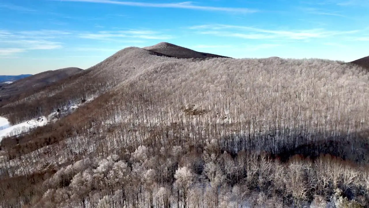 rime ice on trees aerial tilt up near boone nc and blowing rock nc