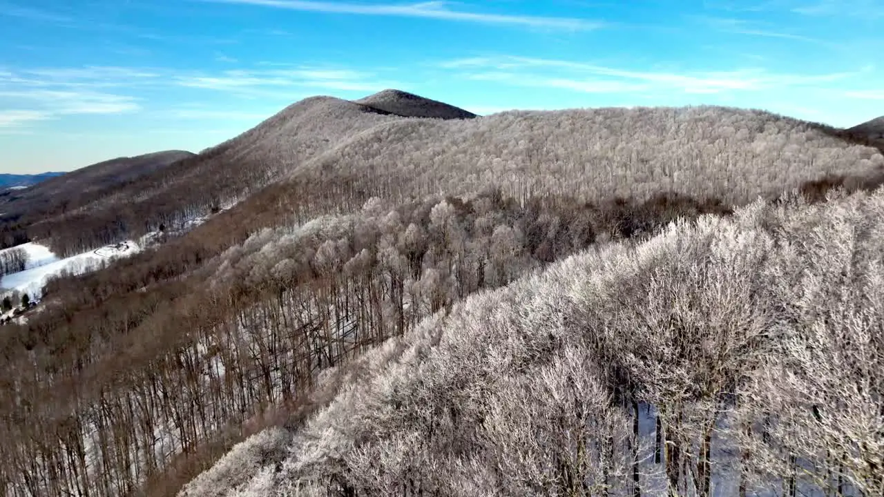 rime ice on treetops in blue ridge mountains aerial near boone nc north carolina