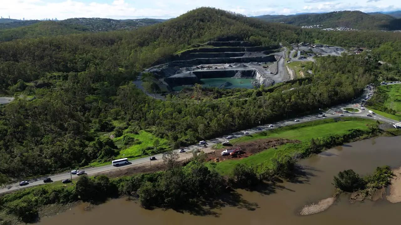 Oxenford Gold Coast 4 January 2024 Left to right aerial views of the Coomera River and Oxenford Quarry