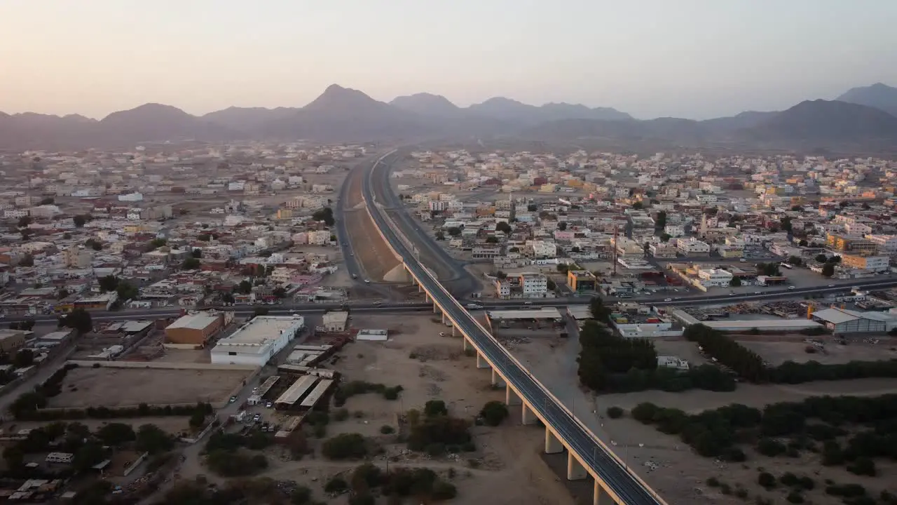 Speed train track crossing a long small town outside Jeddah city all the way to Mecca city