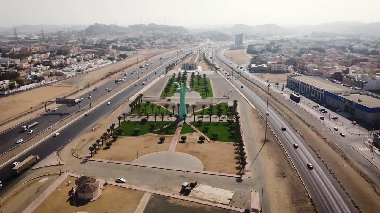 Palm tree park over the highway to Mecca city from Jeddah coast