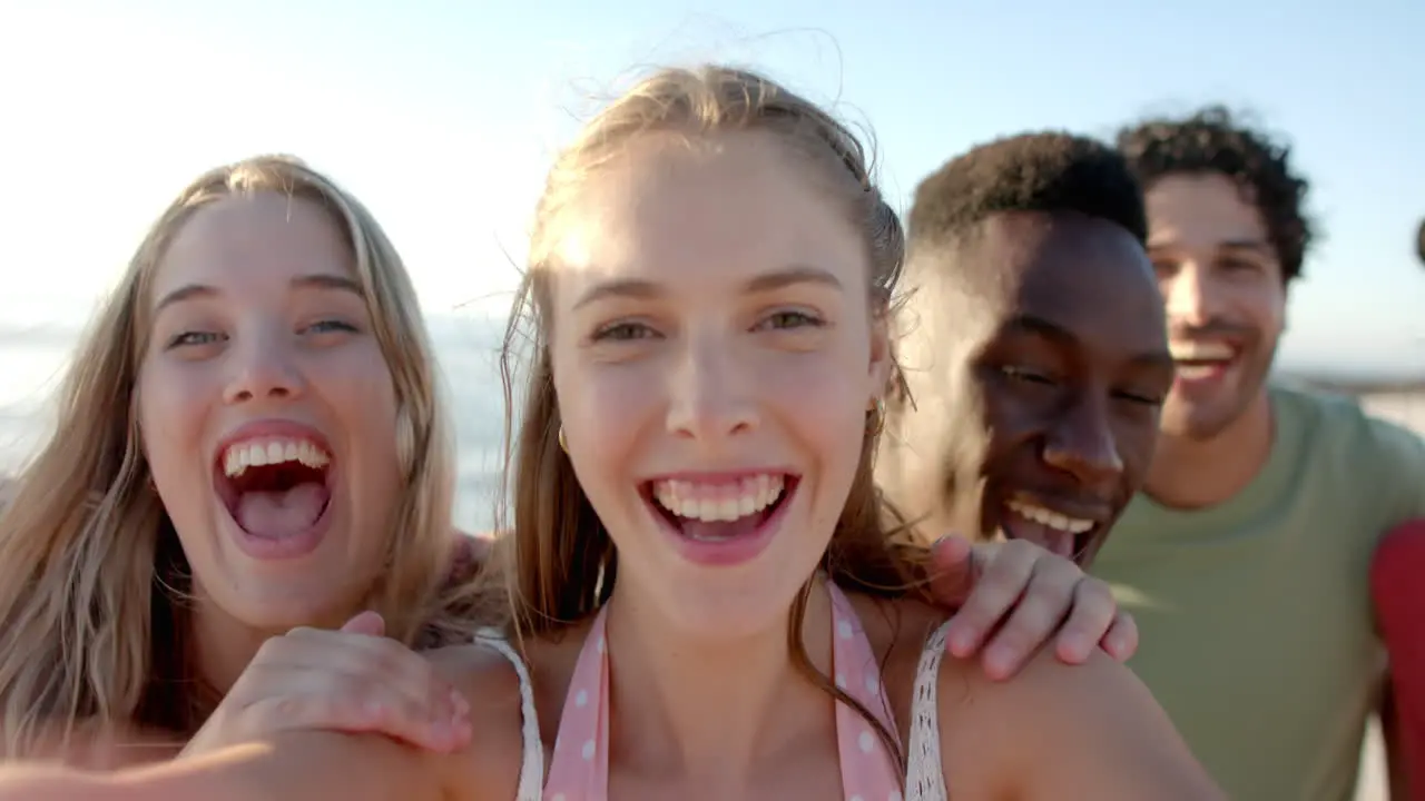 Diverse group of friends share a joyful moment outdoors