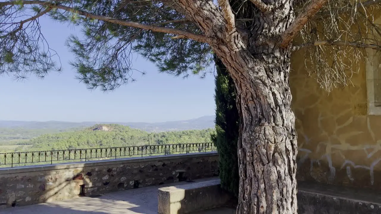 Terrace view of landscape of France with small wall