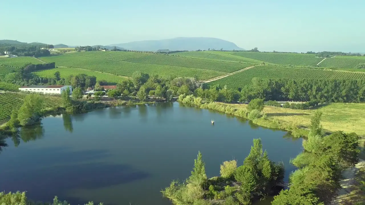 A small reservoir in the middle of crops and farms