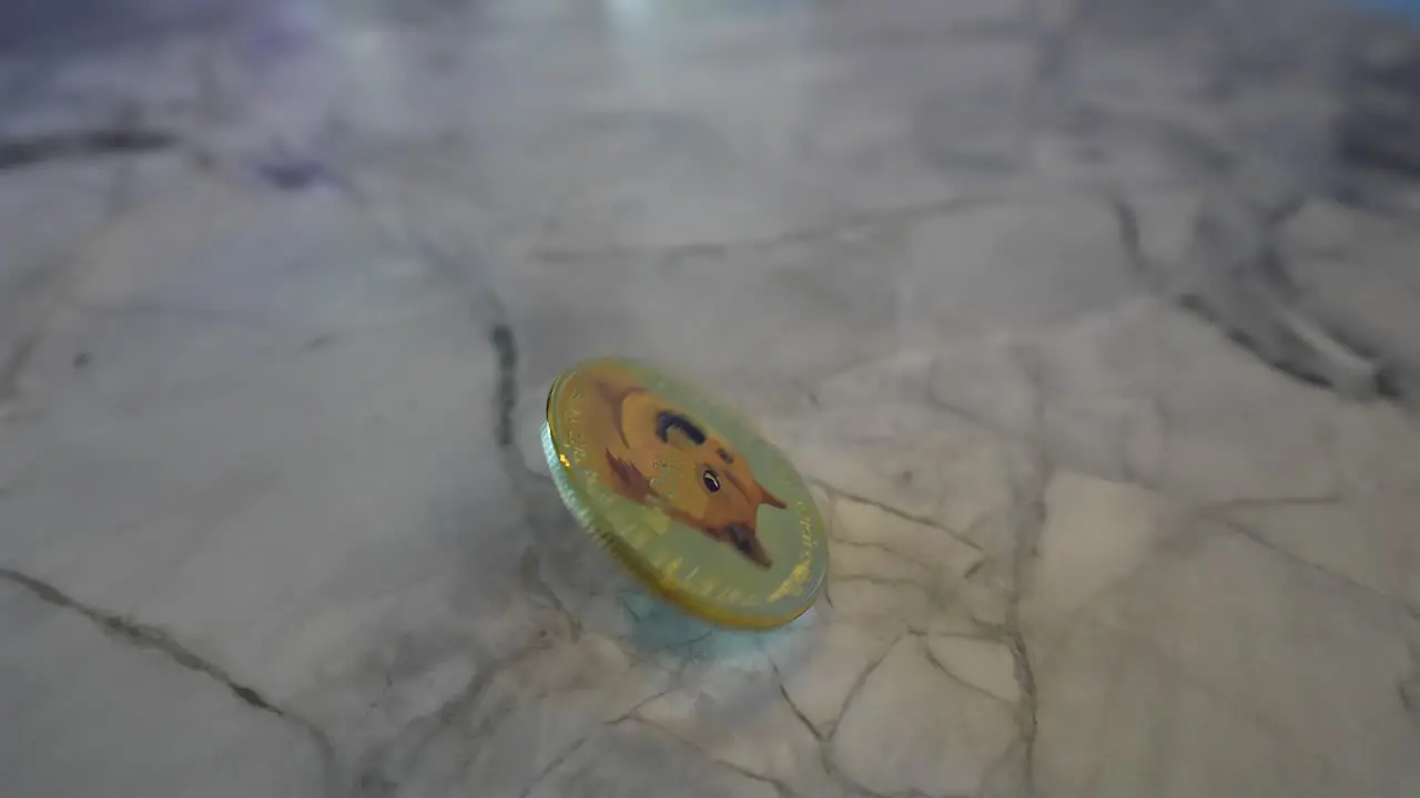 Doge Coin spinning on a stone counter top