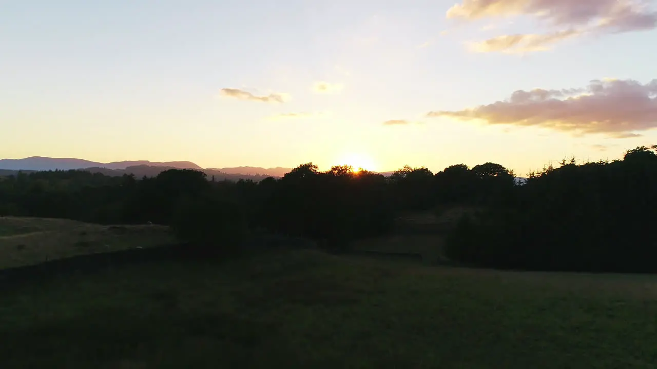 Aerial view of sunset over the countryside near Lake Windermere Lake District UK