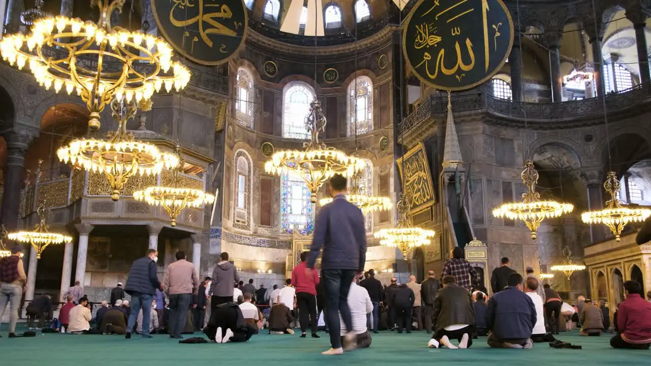 Low Angle Shot of People Praying in Hagia Sophia