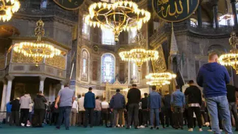 Low Angle Shot of People Praying in the Hagia Sophia