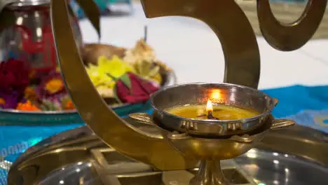 Close Up Of Om Copper Symbol At Hindu Temple