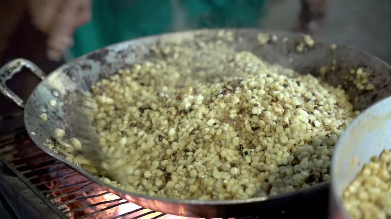 Woman cooking some yummy corn